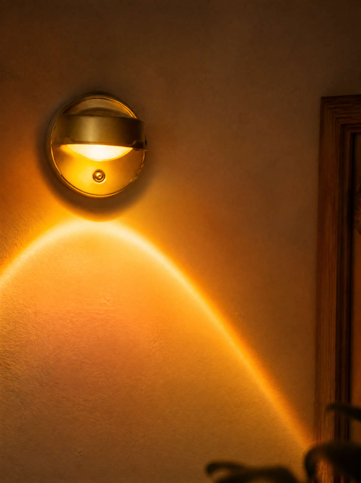 Close-up of the sunset wall light and its warm glow
