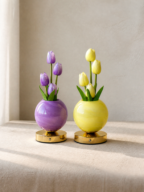 Lilac and yellow cordless tulip lamps in daylight