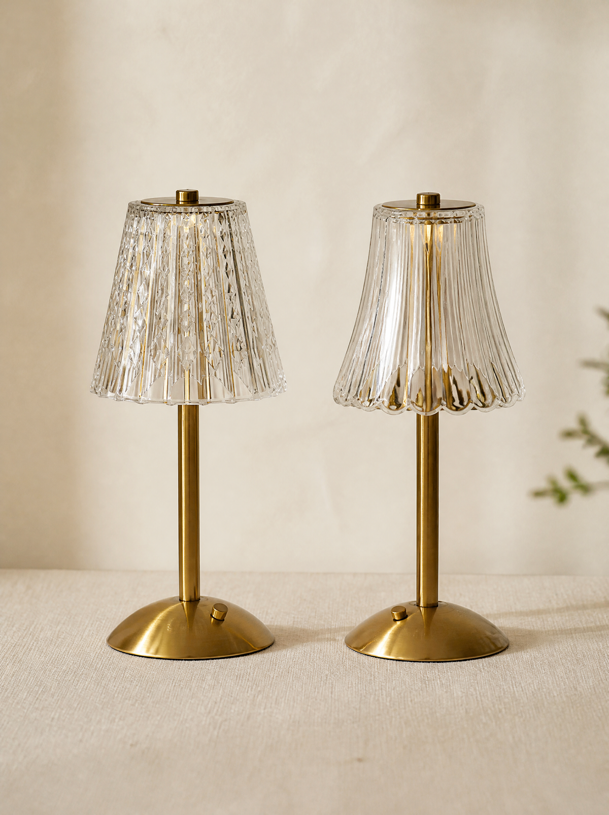 Crystal-cut table lamps with fluted cone and tulip shades in daylight