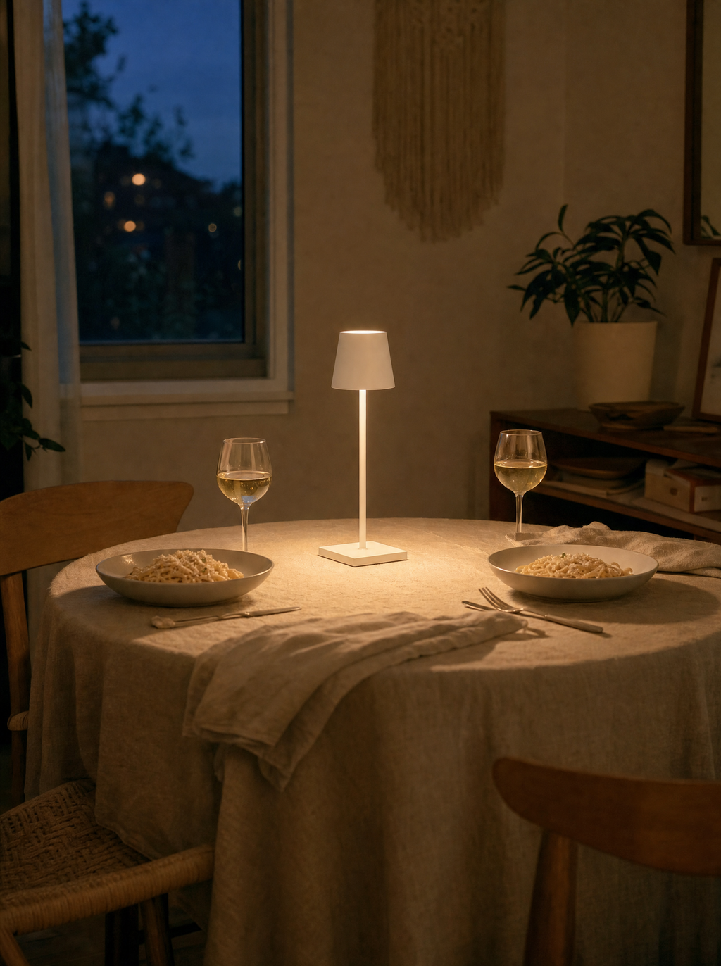 Cordless bistro table lamp on a dinner table for two